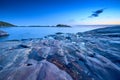 Blue moment in the rocky seashore Royalty Free Stock Photo