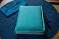 Blue Monday. A book, a notebook and a case with glasses, all in blue tones Royalty Free Stock Photo