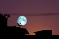 Blue moon back silhouette satellite dish on night sky Royalty Free Stock Photo