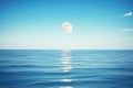 blue moon shining over calm ocean waters Royalty Free Stock Photo