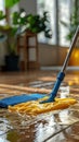 Blue Mop Cleaning Floor Royalty Free Stock Photo