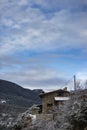 Blue morning cloudscape on a rural farmhouse scene