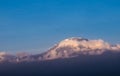 The blue morning sky over the Kilimanjaro 5895m high mount - the highest point of Africa and the highest single free-standing