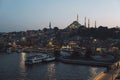 Blue mosque in the evening - lights of Istanbul city - aerial view from the bridge - traffic on the sea Royalty Free Stock Photo