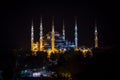 Blue Mosque of Ottoman architecture illuminated by night in Istanbul, Turkey