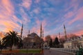 Blue Mosque or Sultanahmet Camii in the morning with orange clouds.