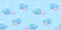 Seamless marine pattern with mother whale and baby whale on a blue background with bubbles