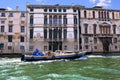Blue motor boat Brusato Trasporti in Grand Canal, Venice