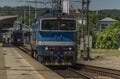 Blue motor engine near fast train