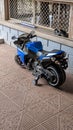 a blue motorcycle bike for kids with training wheels Royalty Free Stock Photo