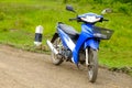 Blue motorcycle on the country road