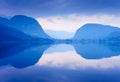 Blue mountains reflected in lake Bohinj, Slovenia.