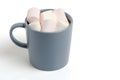Blue mug with cocoa and marshmallows white background Royalty Free Stock Photo