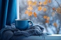 Blue mug window scarf winter. Generate Ai Royalty Free Stock Photo