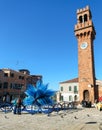 Blue murano glass sculpture in a square in Murano in Venice Ital