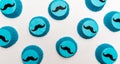 Blue mustache cupcake papers themed for a birthday party