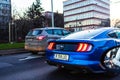 Blue Mustang, waiting in traffic in downtown Bucharest, Romania, 2020