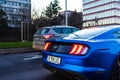 Blue Mustang, waiting in traffic in downtown Bucharest, Romania, 2020