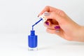 Blue nail polish bottle Royalty Free Stock Photo