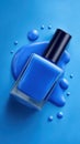 Blue nail polish bottle with spilled polish on matching background Royalty Free Stock Photo
