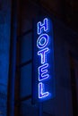 Blue neon hotel sign in the night Royalty Free Stock Photo