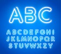 Blue Neon Letters Set. Bright Glowing Font. Latin Alphabet from Luminous Neon Tubes. ABC for Bar, Casino Poster Template Royalty Free Stock Photo