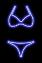 Blue neon silhouette of a women's swimsuit on a black background. Bikini Royalty Free Stock Photo