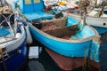 A blue nice boat moored at the harbour