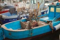 A blue nice boat moored at the harbour