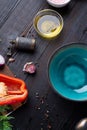 Blue nice bowl and ingredients served at dark wooden table. meditarranean cuisine. flat lay