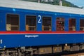 Blue night coach in Austria Graz station in summer holiday morning