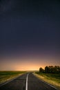 Night Starry Sky Above Country Road In Countryside And Green Field Royalty Free Stock Photo