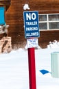 No trailer parking allowed sign in snow