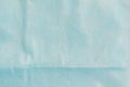 Blue nonwoven fabric for the production of medical clothing, background, texture Royalty Free Stock Photo