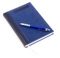 Blue notebook and blue pen