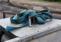 Blue strap with a metal buckle on a trailer