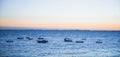 Ocean in Salvador, Brazil and some boats fishing