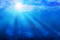 Blue ocean underwater sun rays background