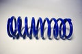 blue off-road suspension springs on a white background Royalty Free Stock Photo