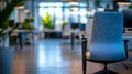 A blue office chair sitting in an empty office space Royalty Free Stock Photo