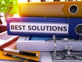 Blue Office Folder with Inscription Best Solutions Royalty Free Stock Photo