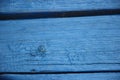 Blue oil paint texture with spots and streaks on wooden surface Royalty Free Stock Photo