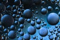 Oil bubbles macro blue background Royalty Free Stock Photo