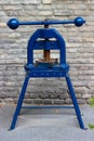 Blue old antique steel wine press Royalty Free Stock Photo