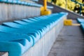 Blue old bench seats in tribune