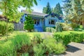 Blue old cute craftsman style home.