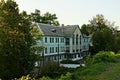 Blue old multi-storey house in a green garden Royalty Free Stock Photo