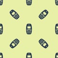 Blue Old vintage keypad mobile phone icon isolated seamless pattern on yellow background. Retro cellphone device Royalty Free Stock Photo