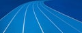 Blue Olympic track lanes with white stripes, an empty background suitable for copy space, represent the concept of physical sports Royalty Free Stock Photo