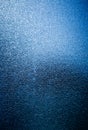 Blue opaque glass with ice illusion Royalty Free Stock Photo